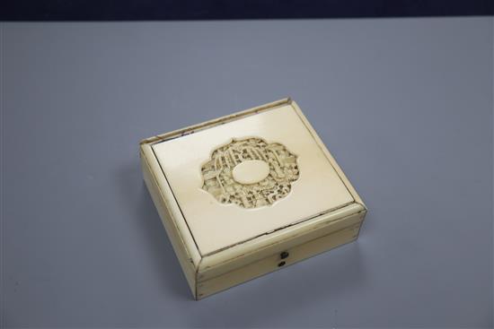 A Chinese carved ivory box with mother of pearl gaming counters